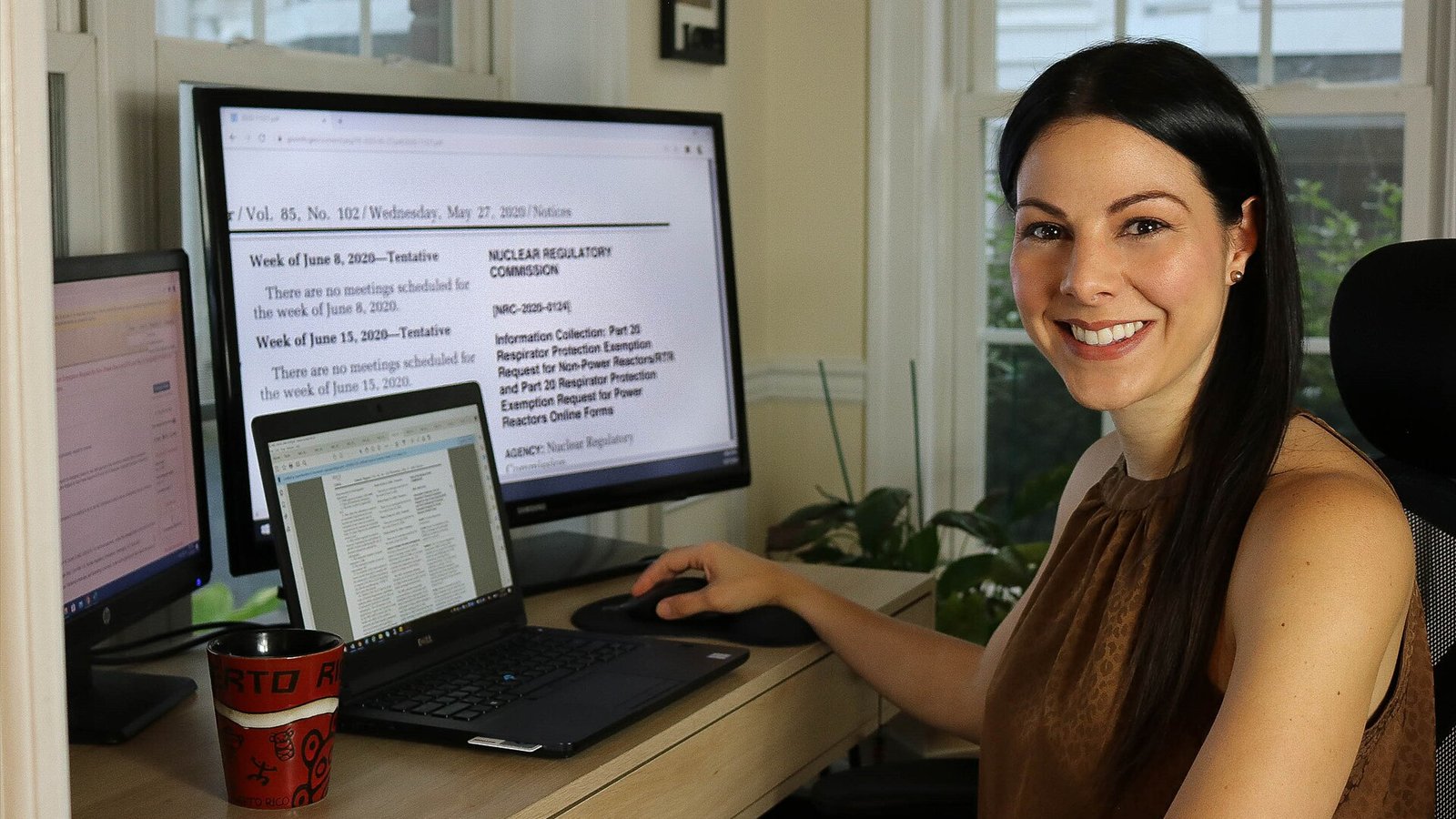 Woman sitting at computer