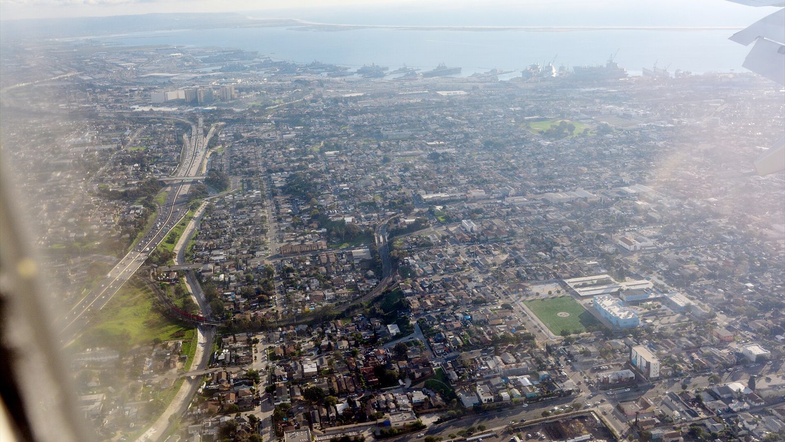 Aerial view looking roughly south past Stockton and Logan Heights, San Diego, California, toward National City and San Diego Bay.