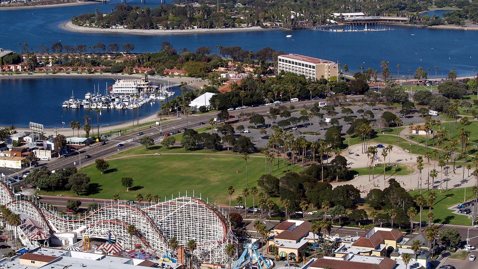 A photo of Mission Bayin San Diego, California looking to the east-northeast. Visible are the Giant Dipper Roller Coaster , Bonita Cove, Bahia Point, Vacation Island and Fiesta Island. Please acknowledge "Phil…