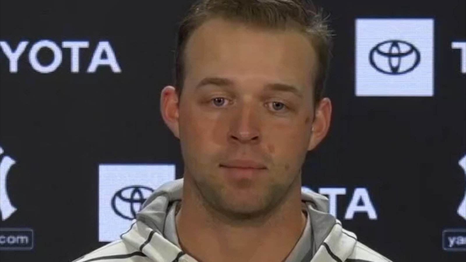 Baseball pitcher Michael King wearing a dark cap during a 2021 interview.