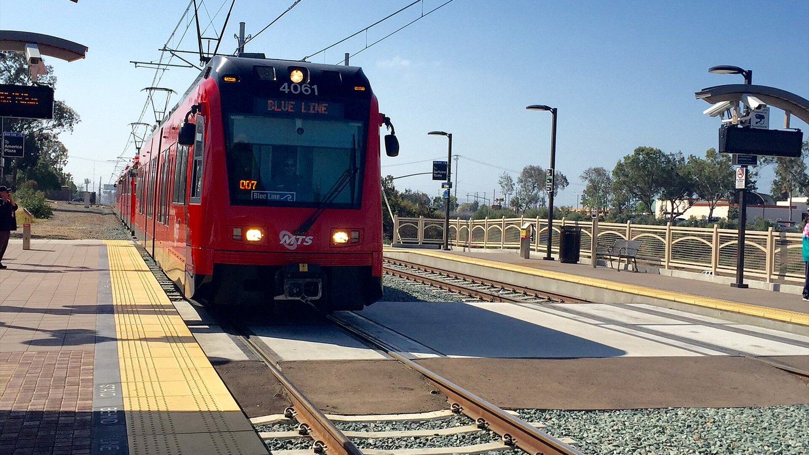 Blue Line trolley arriving at E Street Station of San Diego Trolley.
