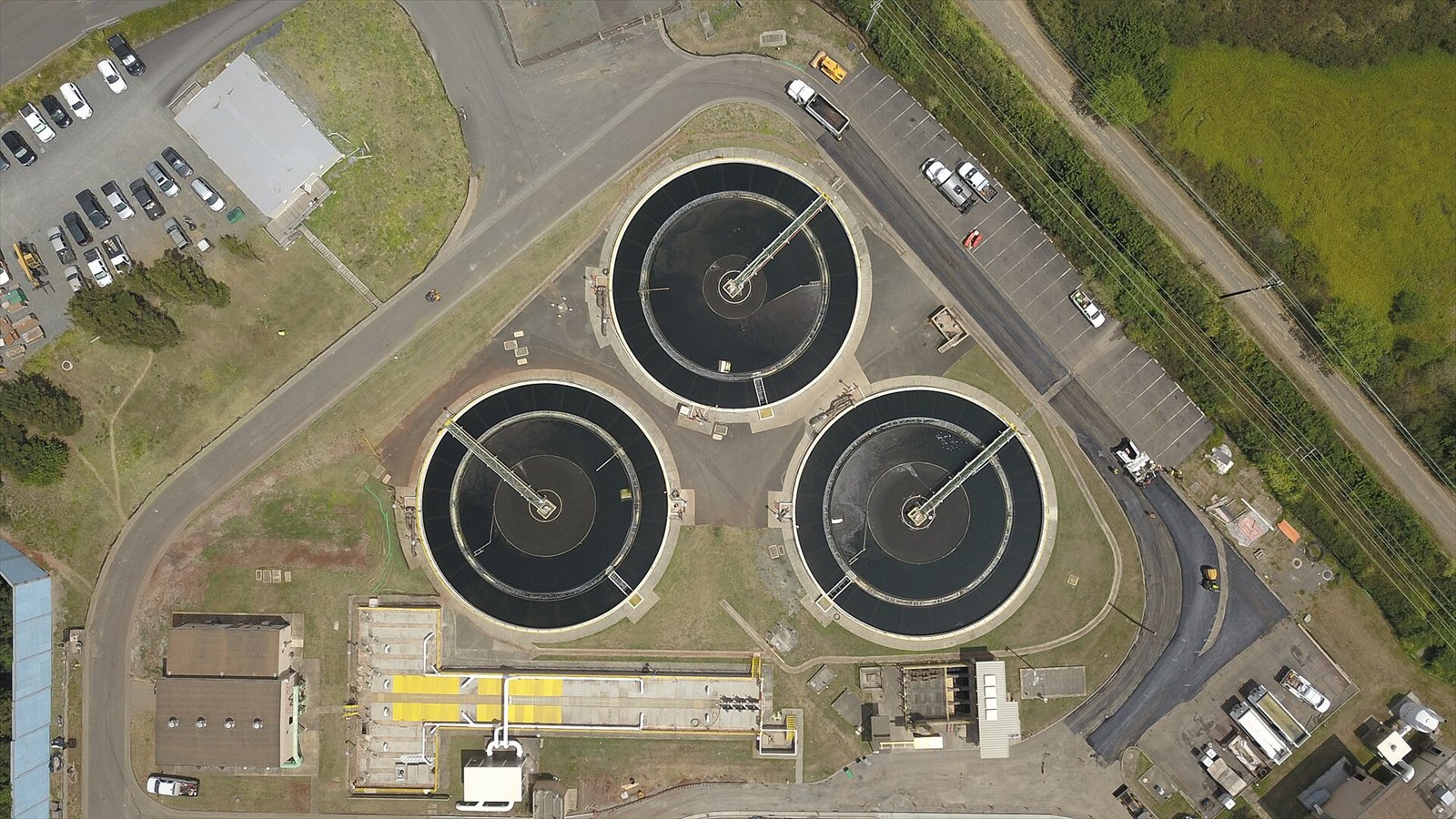 Three wastewater/sewage clarifiers at the Kailua Regional Wastewater Treatment Plant in Hawaii. The plant serves most of Kaneohe, Kailua, and MCBH. (Marine Corps Base Hawaii) This picture was taken near ʻAikahi…