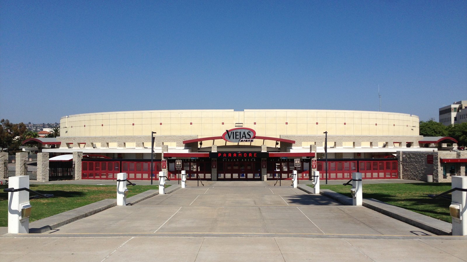 The exterior entrance and curved facade of Viejas Arena at San Diego State University.