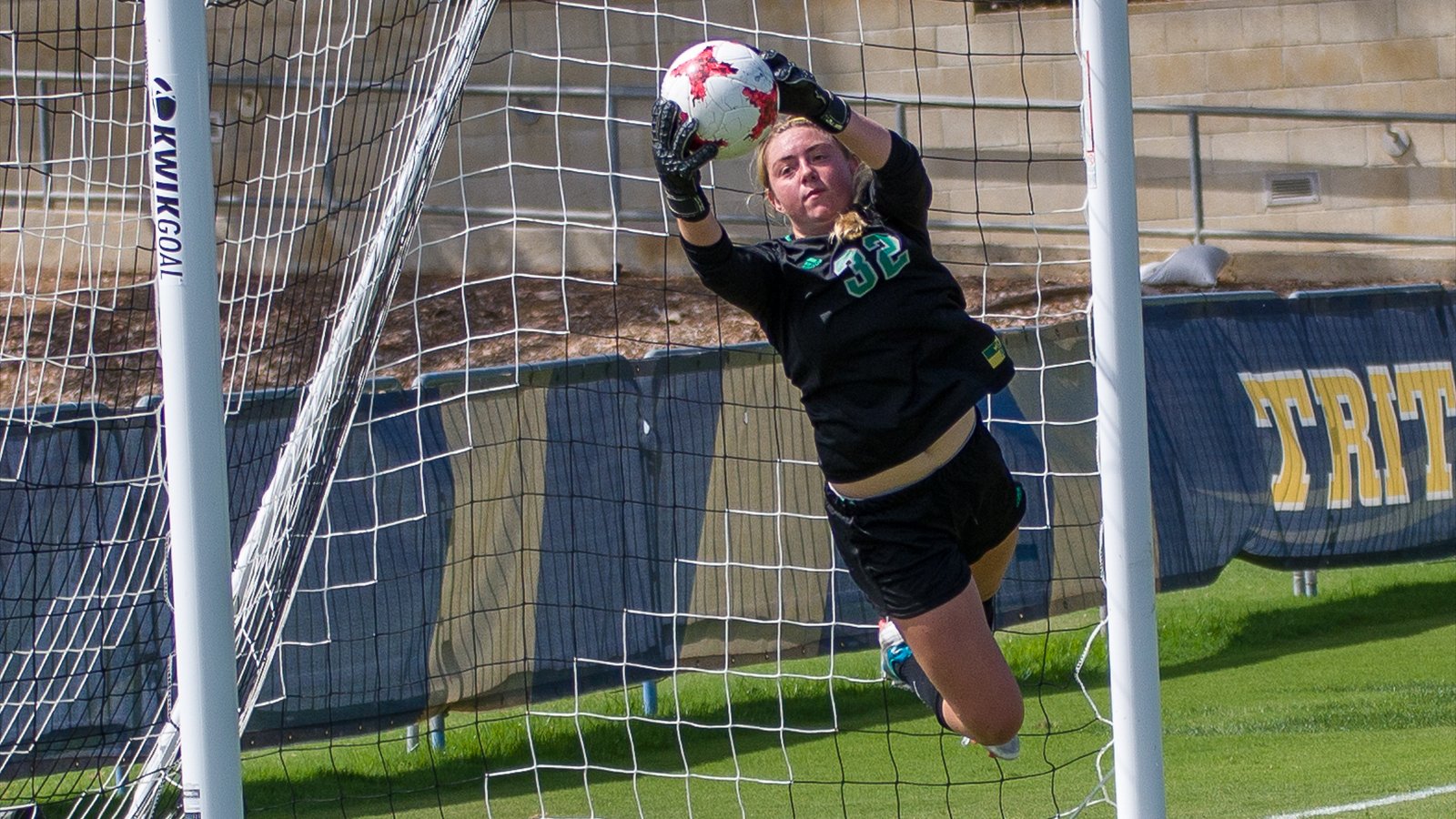 UC San Diego and Humboldt State women's soccer players chase the ball during a 2018 match.